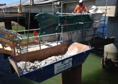 Screens and staging installed to stop concrete and concrete dust dropping into the coastal marine area (Source: SouthernSkies).